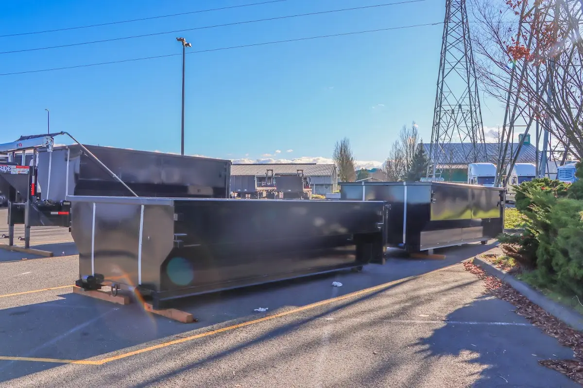 Roll-off dumpster ready for waste disposal at job site for 3 Yard Dumpster Rental in Scottdale